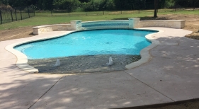 Beach-Entry-Pool-with-Custom-Raised-Wall