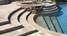 Pool-with-Rasied-Spa-and-Paving