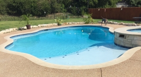 Pool-with-Tanning-Ledge-and-Spillway-Spa